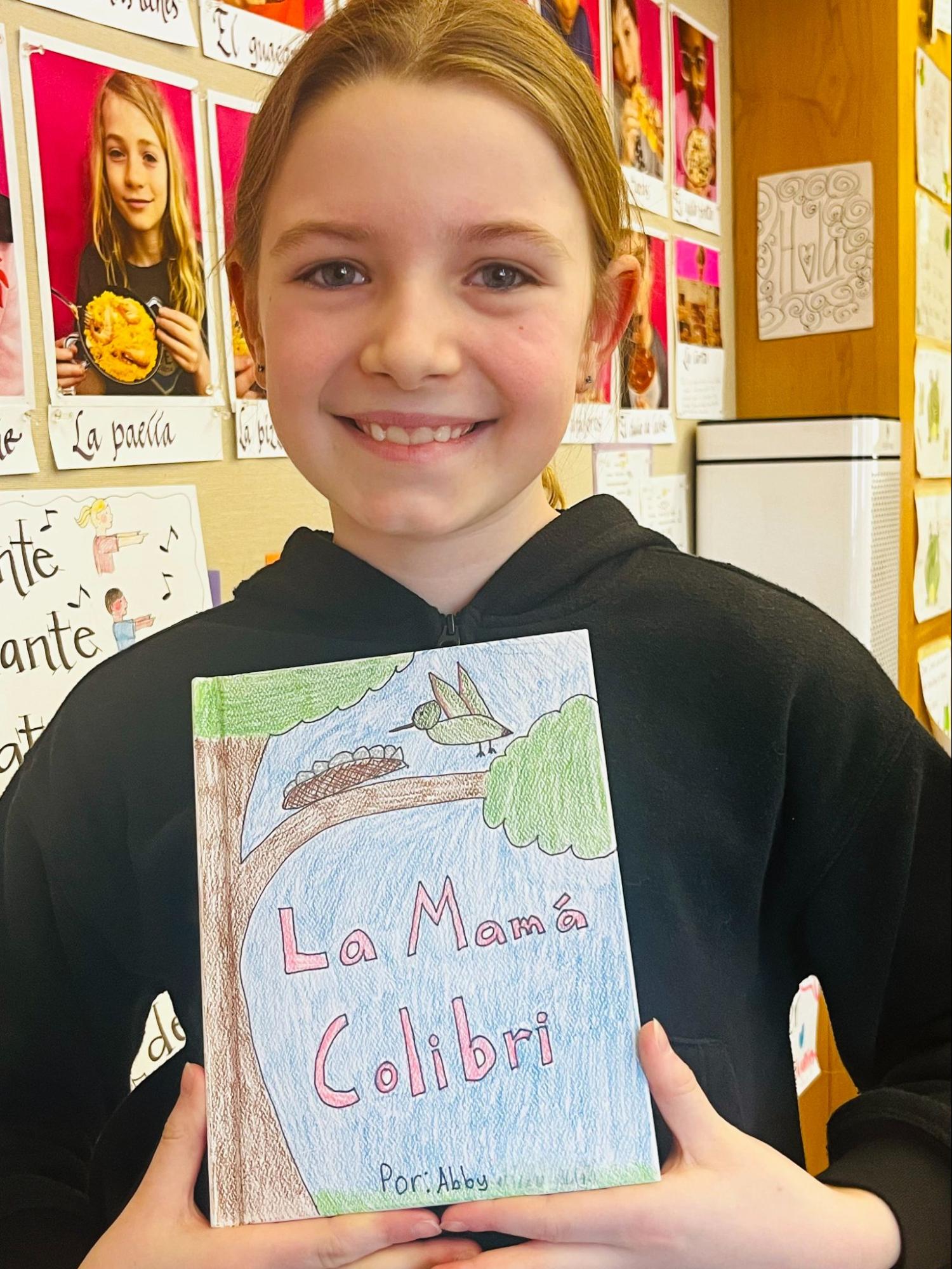 Ethical Culture student with Spanish book