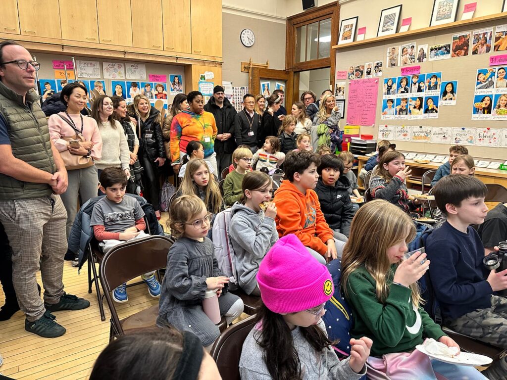 Audience listens along during Ethical Culture Book Fair author event.