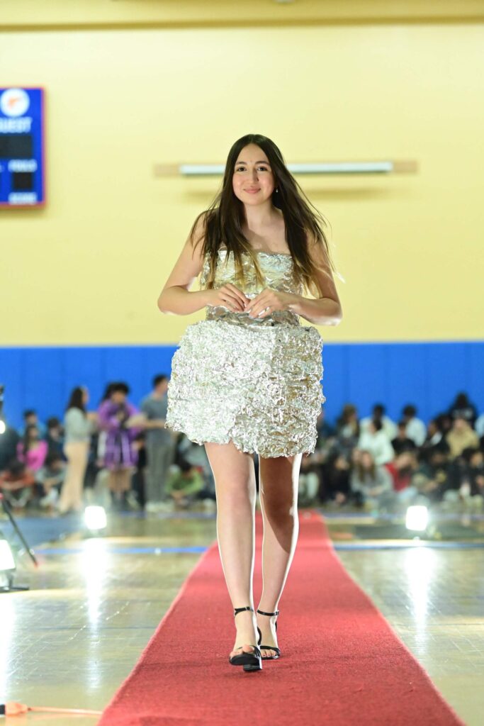 An Ethical Culture Fieldston Middle School student models at the Fashion Show.