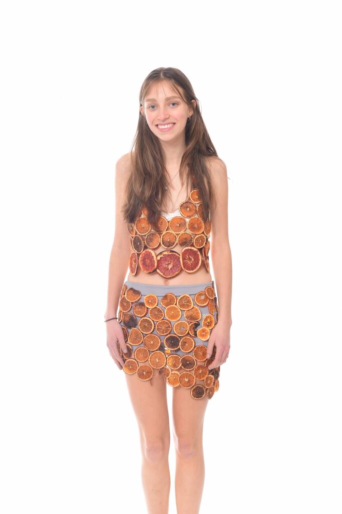 An Ethical Culture Fieldston Upper School student models at the Fashion Show.