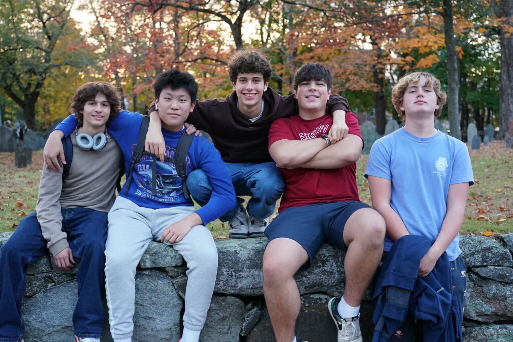 Ethical Culture Fieldston School_Feel Good Photos_Upper School students sitting in a park during a Boston field trip