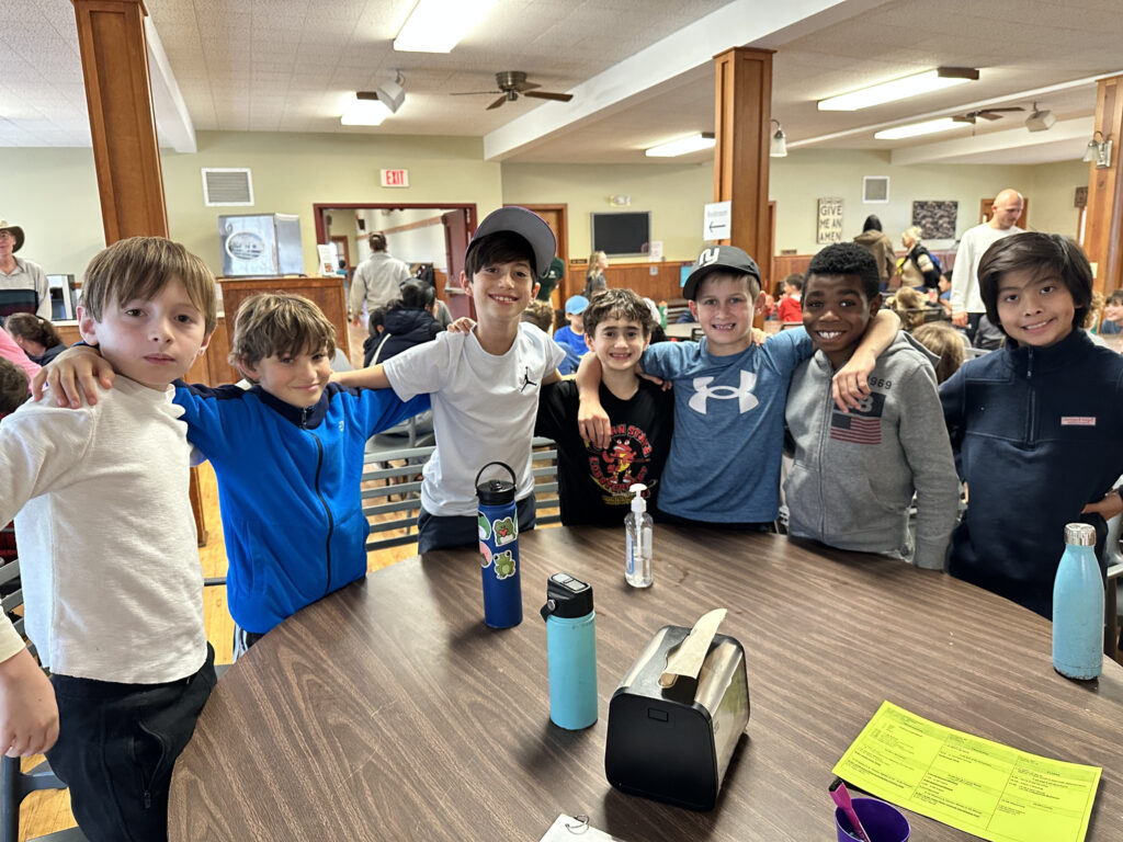 Students pose together in dining hall at Nature's Classroom.