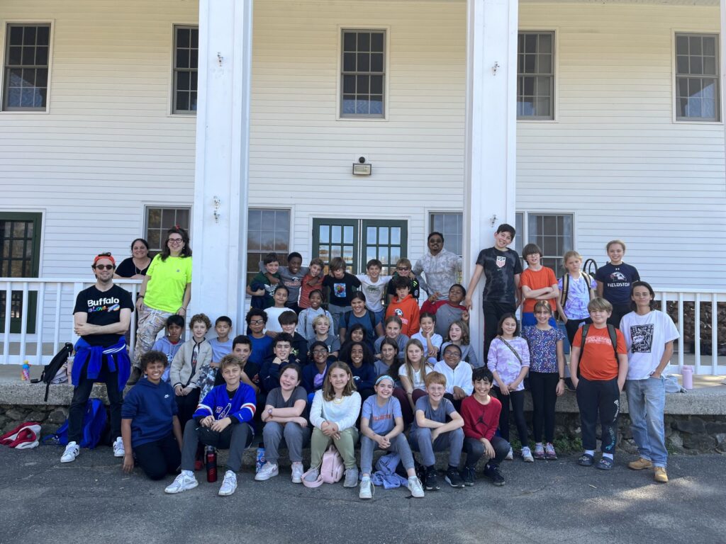 Fieldston Lower students and chaperone pose in big group at Nature's Classroom.