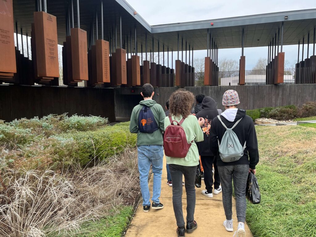 Some Fieldston Upper students walk through a site on their Alabama tour.