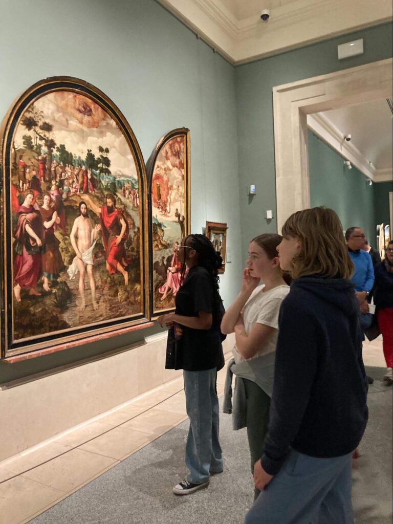 A group of Ethical Culture Fieldston Middle School students tour an art museum in Spain
