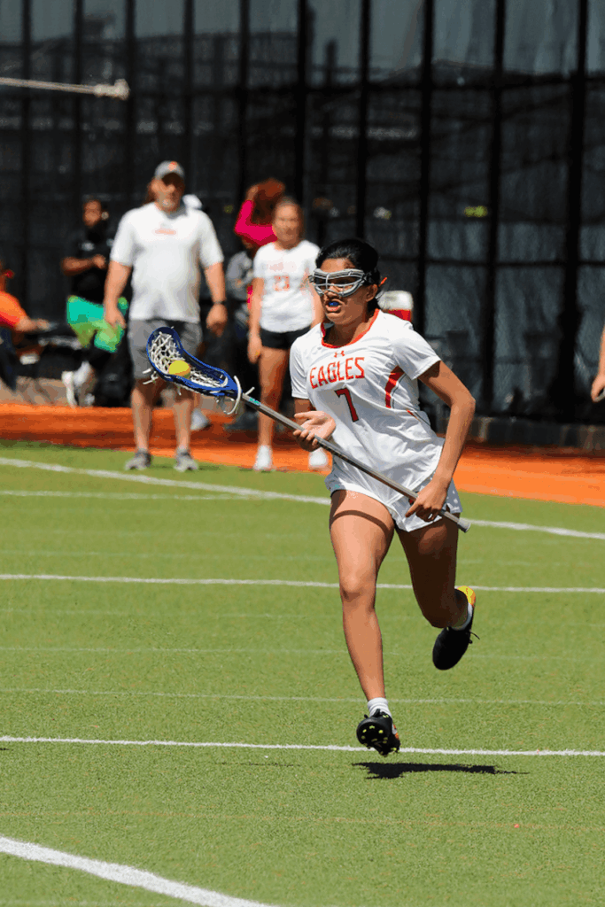 An Ethical Culture Fieldston lacrosse player participates at Spring Fling.