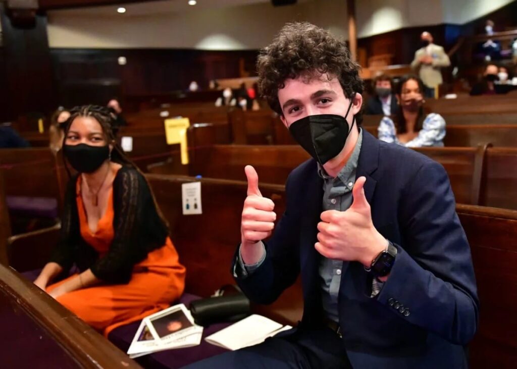 Student gives thumbs up at Founder's Day