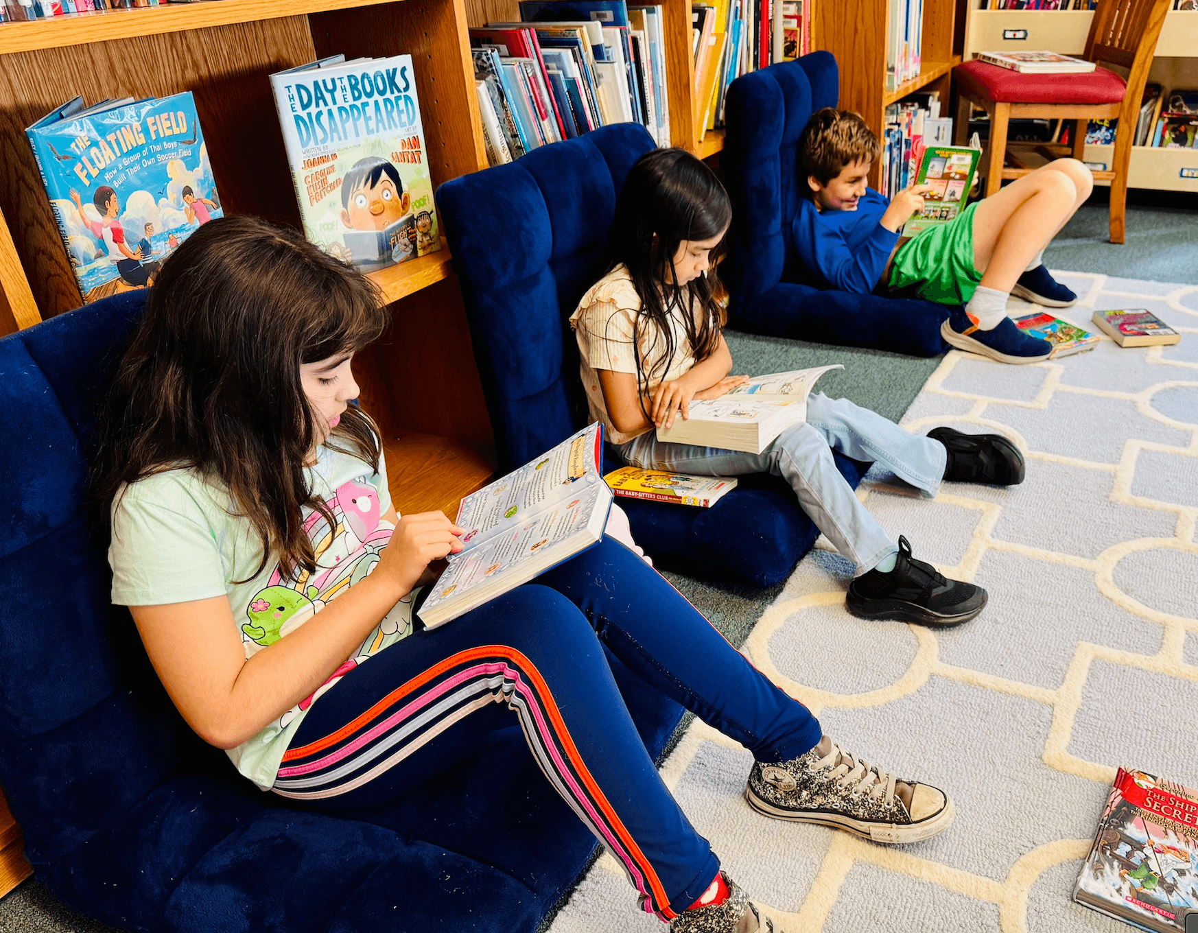 Ethical Culture Fieldston School 3rd Graders read in the library.