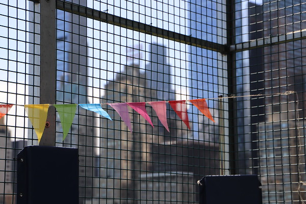 Photo of colorful banners on Ethical Culture rooftop