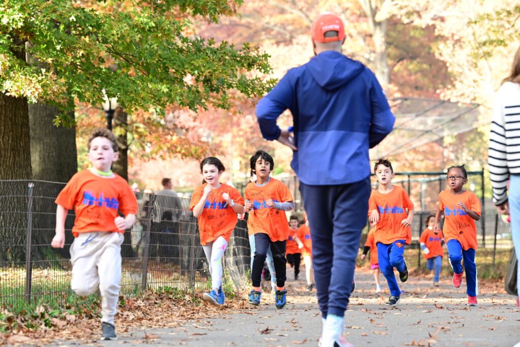 kids running through the park scaled 1